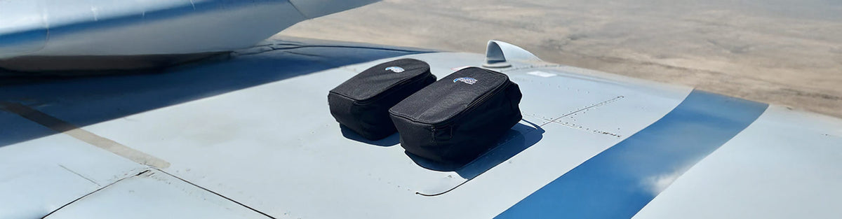 Padded headset storage bag with handle for one or two aviation headsets and accessories