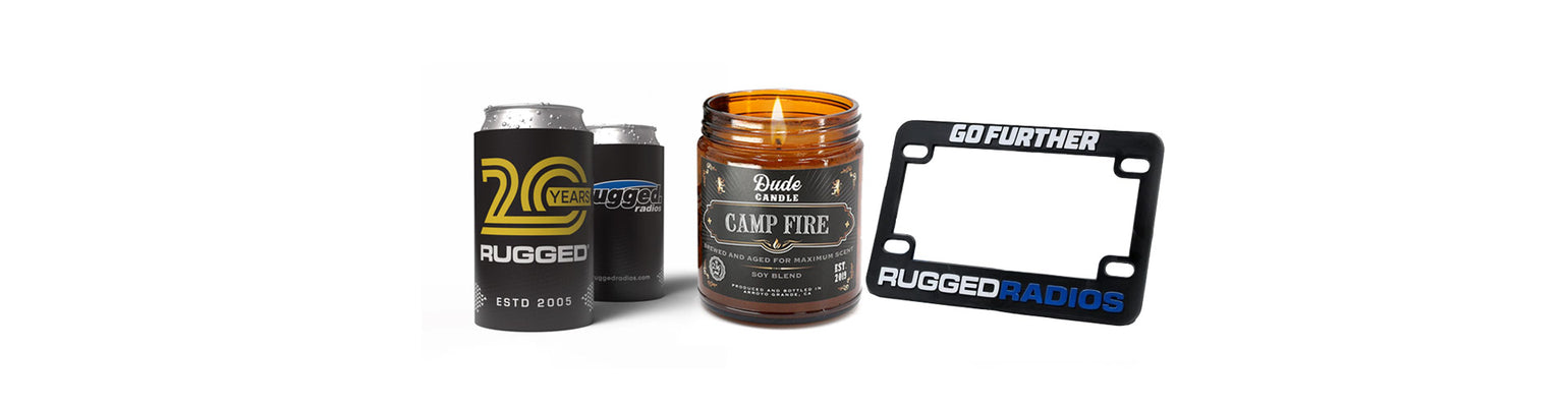 Rugged Radios Collection swag—various decals, branded stickers, promotional patches, apparel gift cards, and small swag items for fans and giveaways